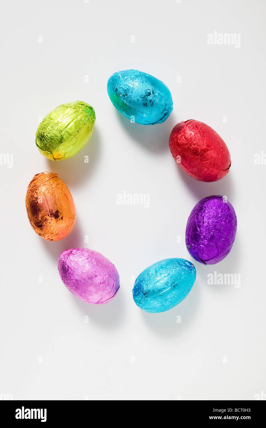 Small chocolate eggs wrapped in foil - Stock Photo