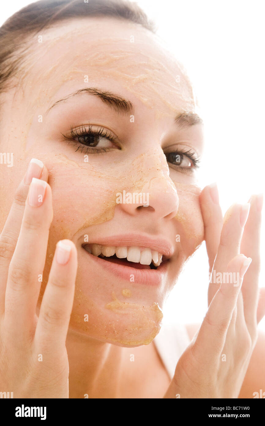 woman cleaning face with gel Stock Photo Alamy