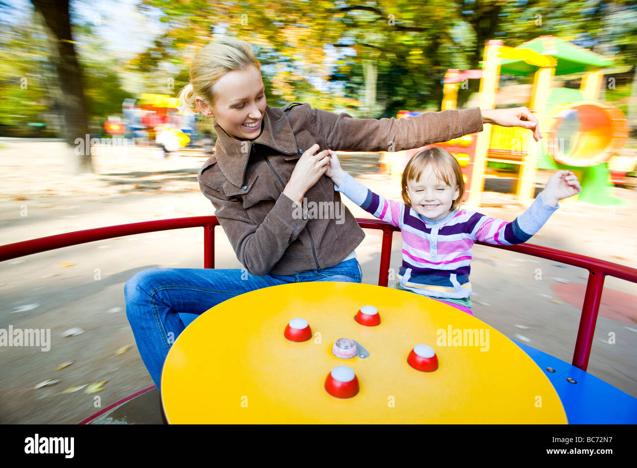 mother and child in playground Stock Photo - Alamy