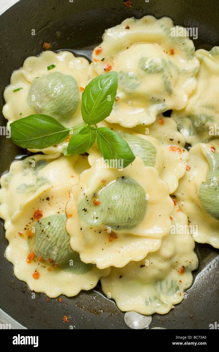 Ravioli with fresh basil (overhead view Stock Photo - Alamy