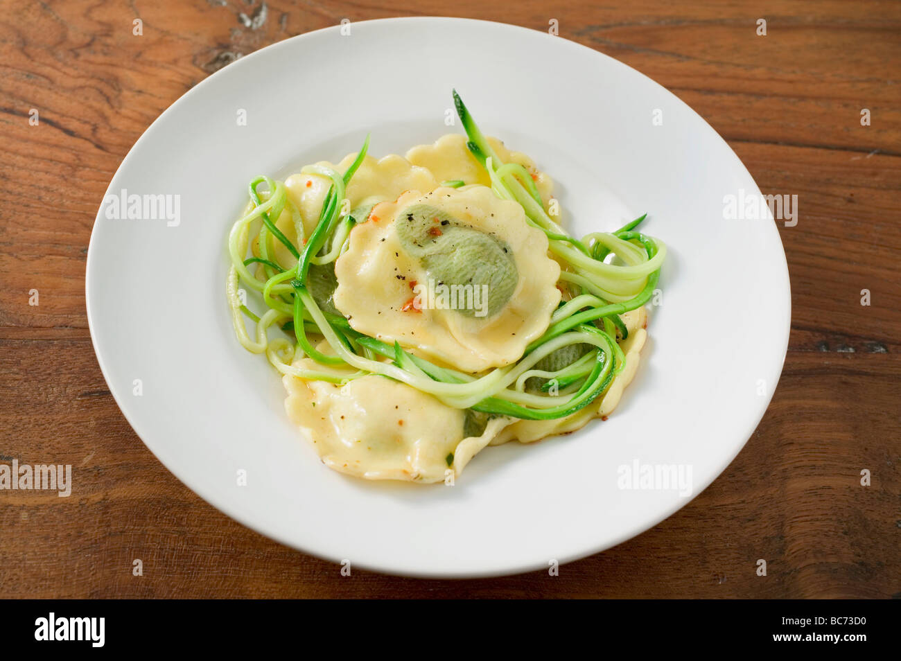 Ravioli with courgette laces - Stock Photo