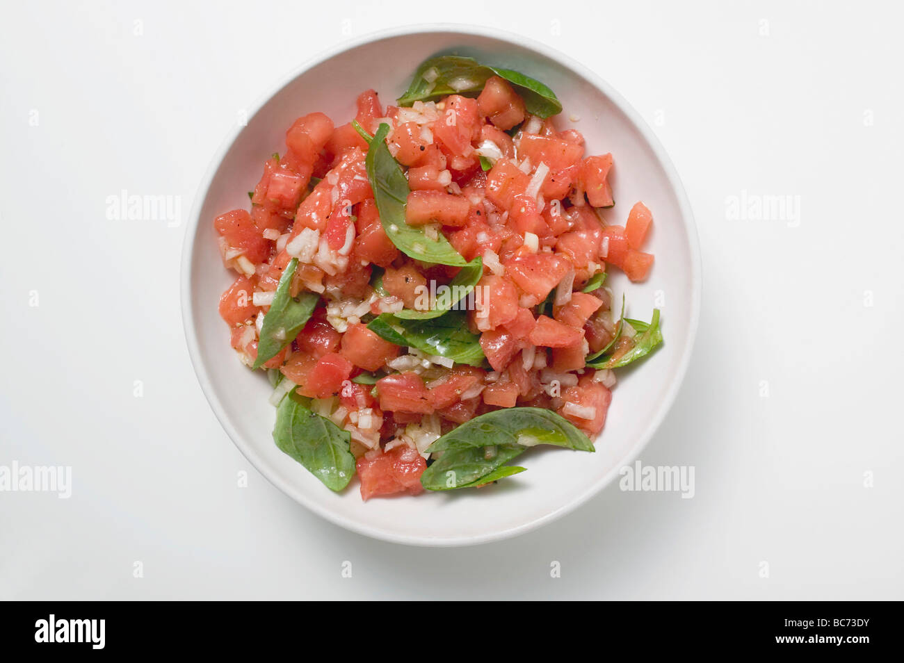 Tomato salsa with fresh basil Stock Photo Alamy