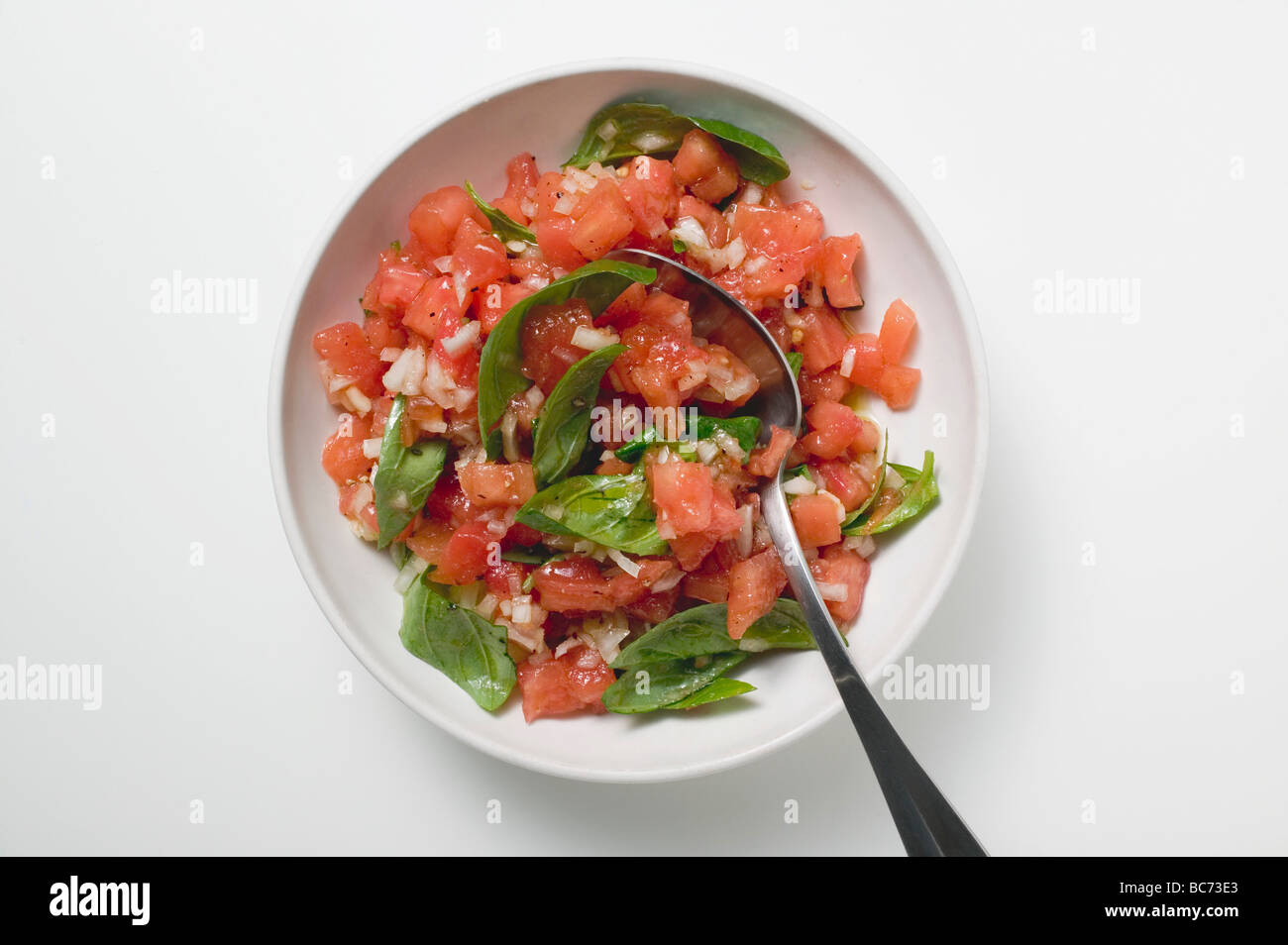 Tomato salsa with fresh basil Stock Photo Alamy