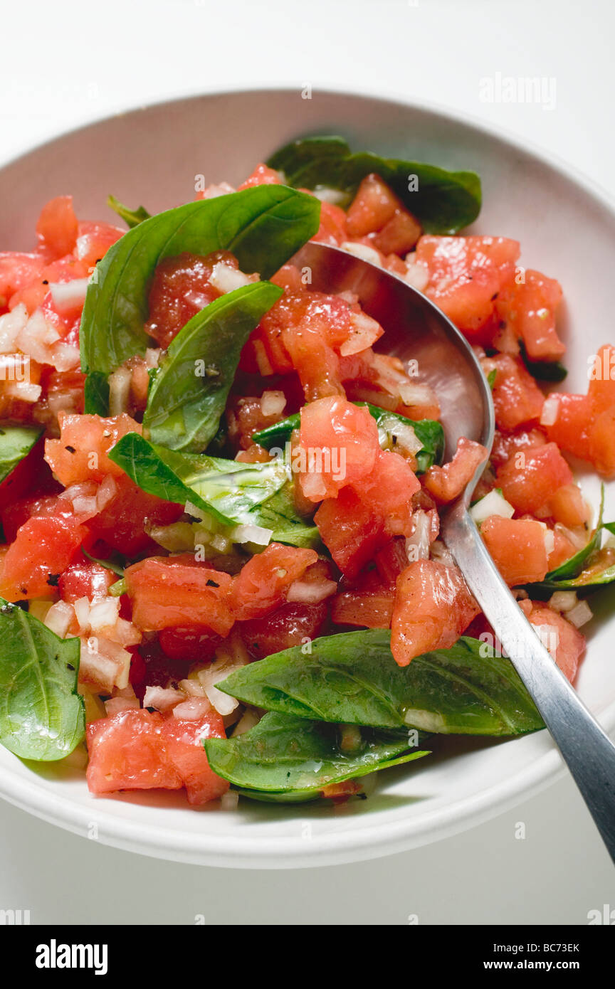 Tomato salsa with fresh basil Stock Photo Alamy