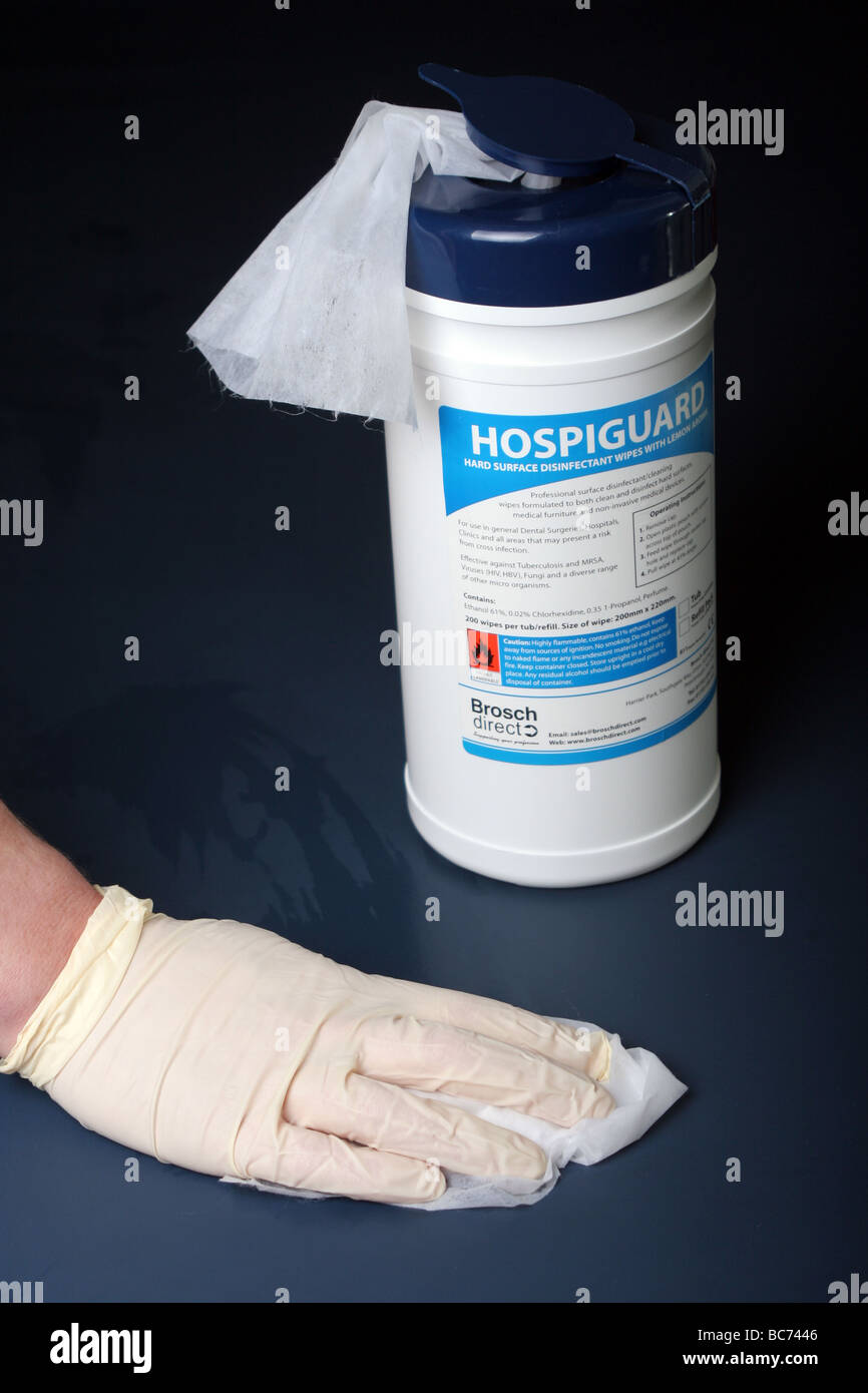 Nurse using Hospiguard cleaning wipe effective against MRSA, TB, HIV