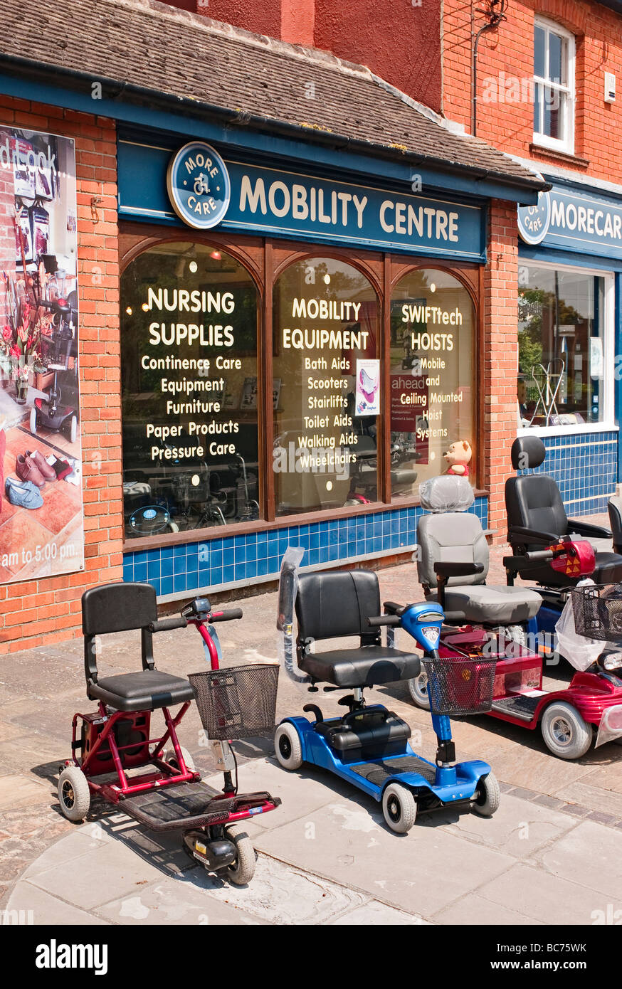 Motorized scooters for disabled persons on display and for sale Stock Photo