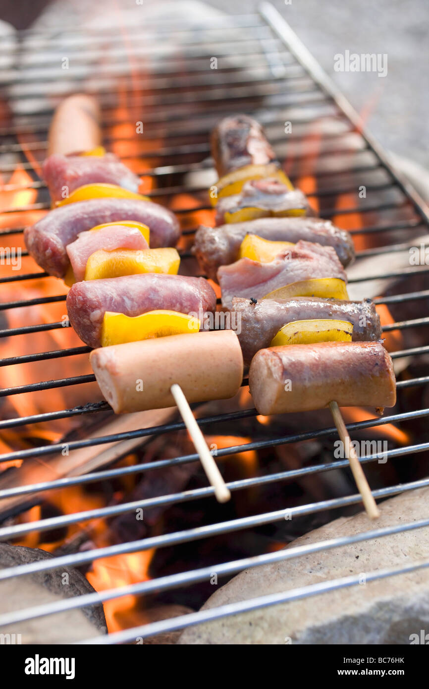 Sausage and pepper kebabs on barbecue Stock Photo Alamy