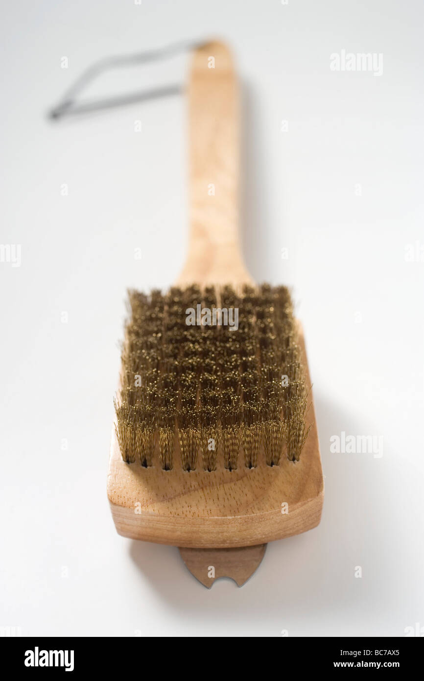 Wire brush for cleaning the barbecue grill rack Stock Photo Alamy
