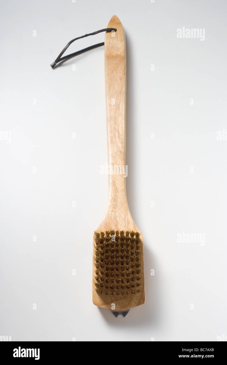 Wire brush for cleaning the barbecue grill rack Stock Photo Alamy