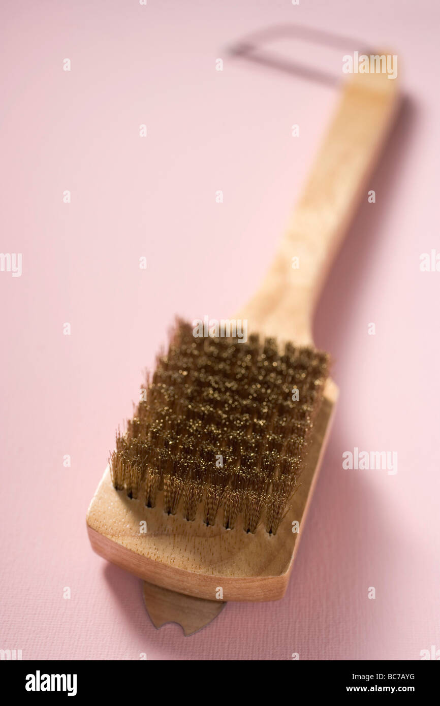 Wire brush for cleaning the barbecue grill rack Stock Photo Alamy