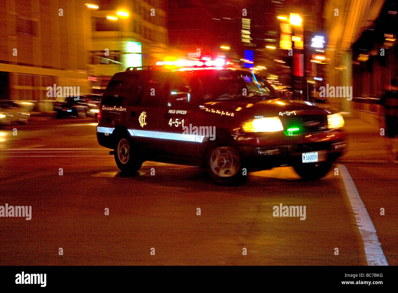 Chicago Fire Department command vehicle in motion Chicago Illinois USA Stock Photo