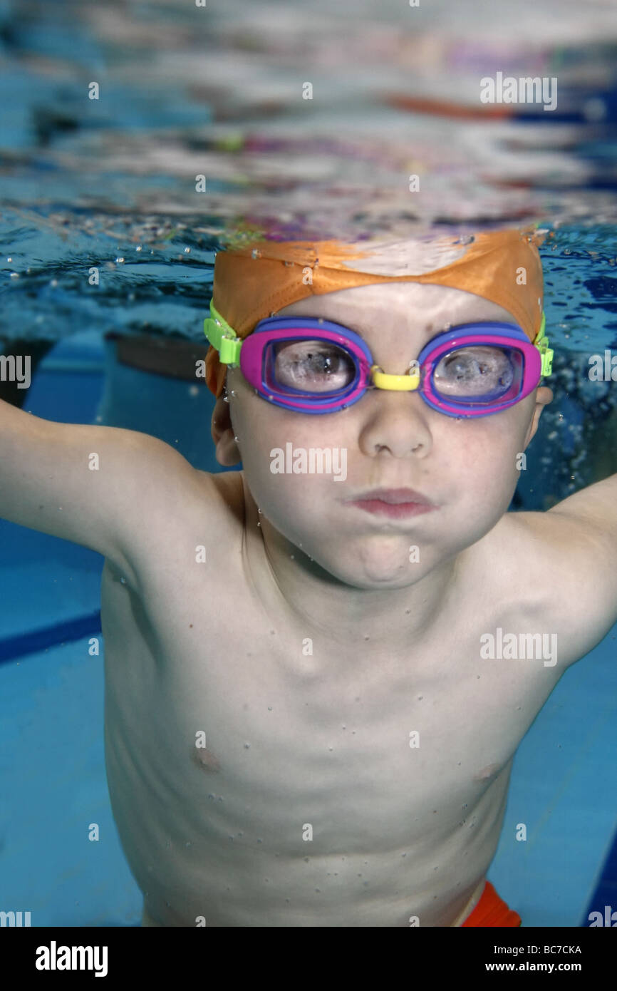 Underwater picture of a young boy using glasses Stock Photo Alamy