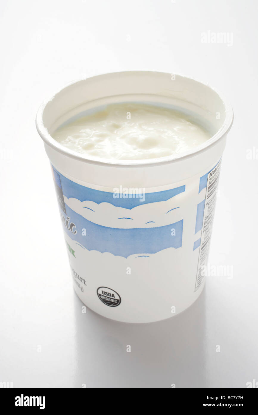 Natural yoghurt in yoghurt pot Stock Photo Alamy