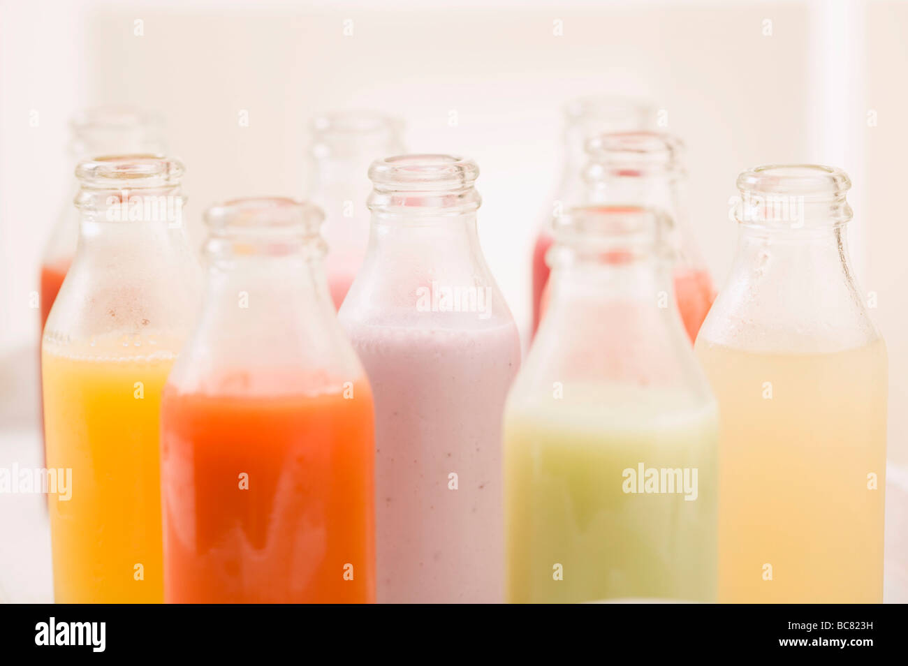 Various different juices in small bottles Stock Photo Alamy