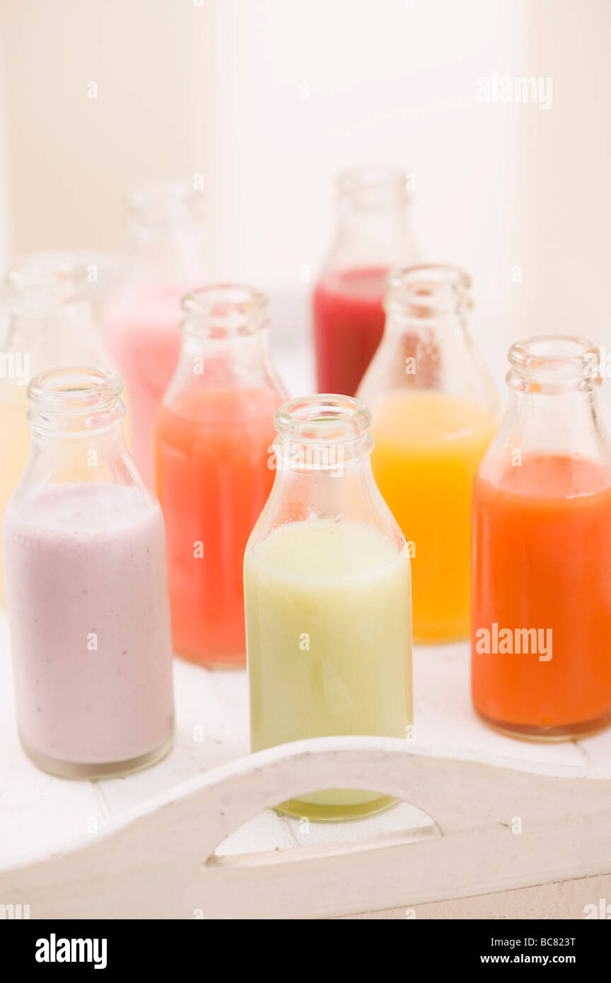 Various different juices in small bottles on tray Stock Photo Alamy