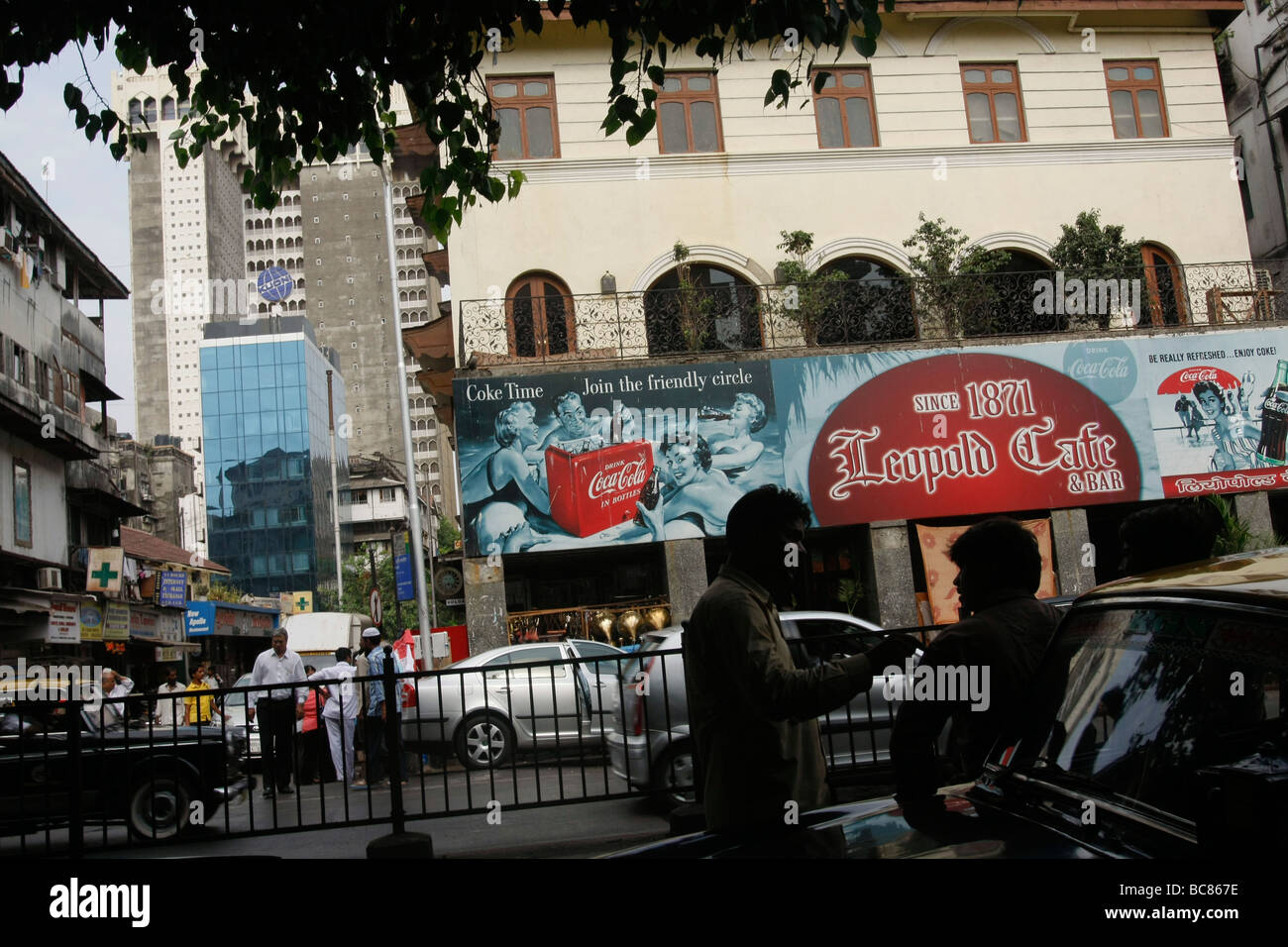 A street view of Leopold Cafe and the Taj Hotel background in Colaba in Mumbai in India Stock Photo