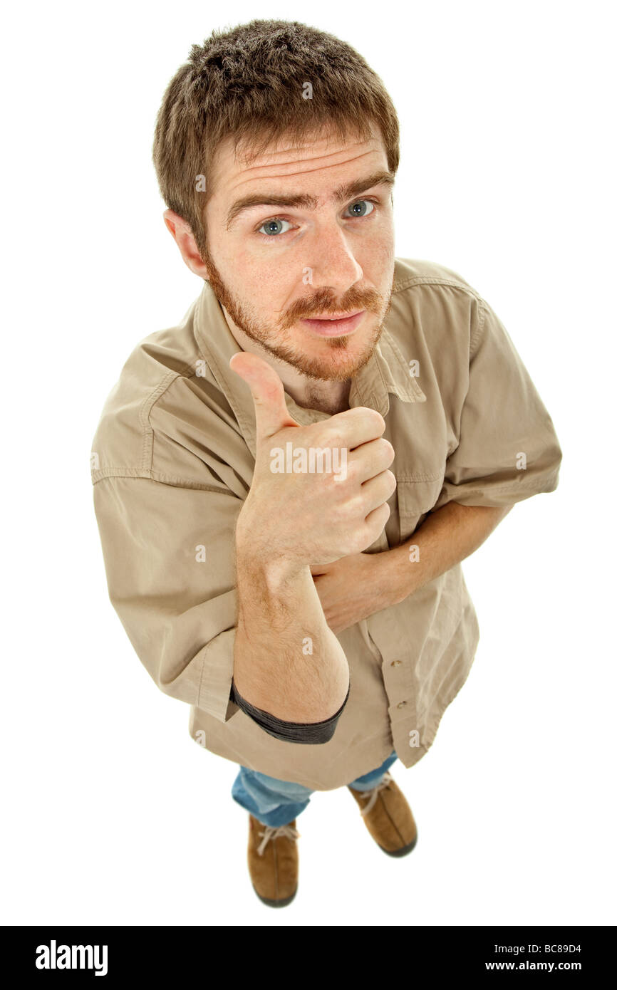 young casual man going thumbs up in a white background Stock Photo