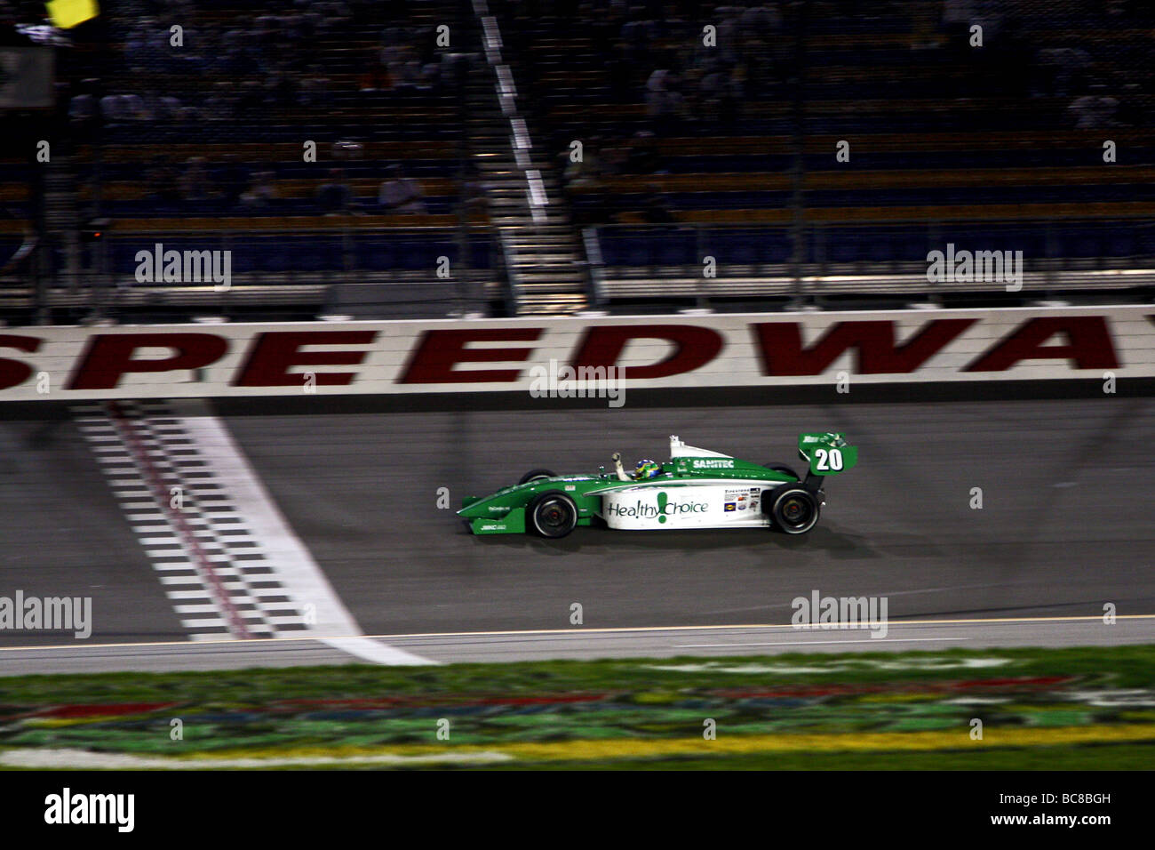Indy Lights Race Series checkered flag Ana Beatriz Iowa Speedway race finish at night, Indy Lights Stock Photo