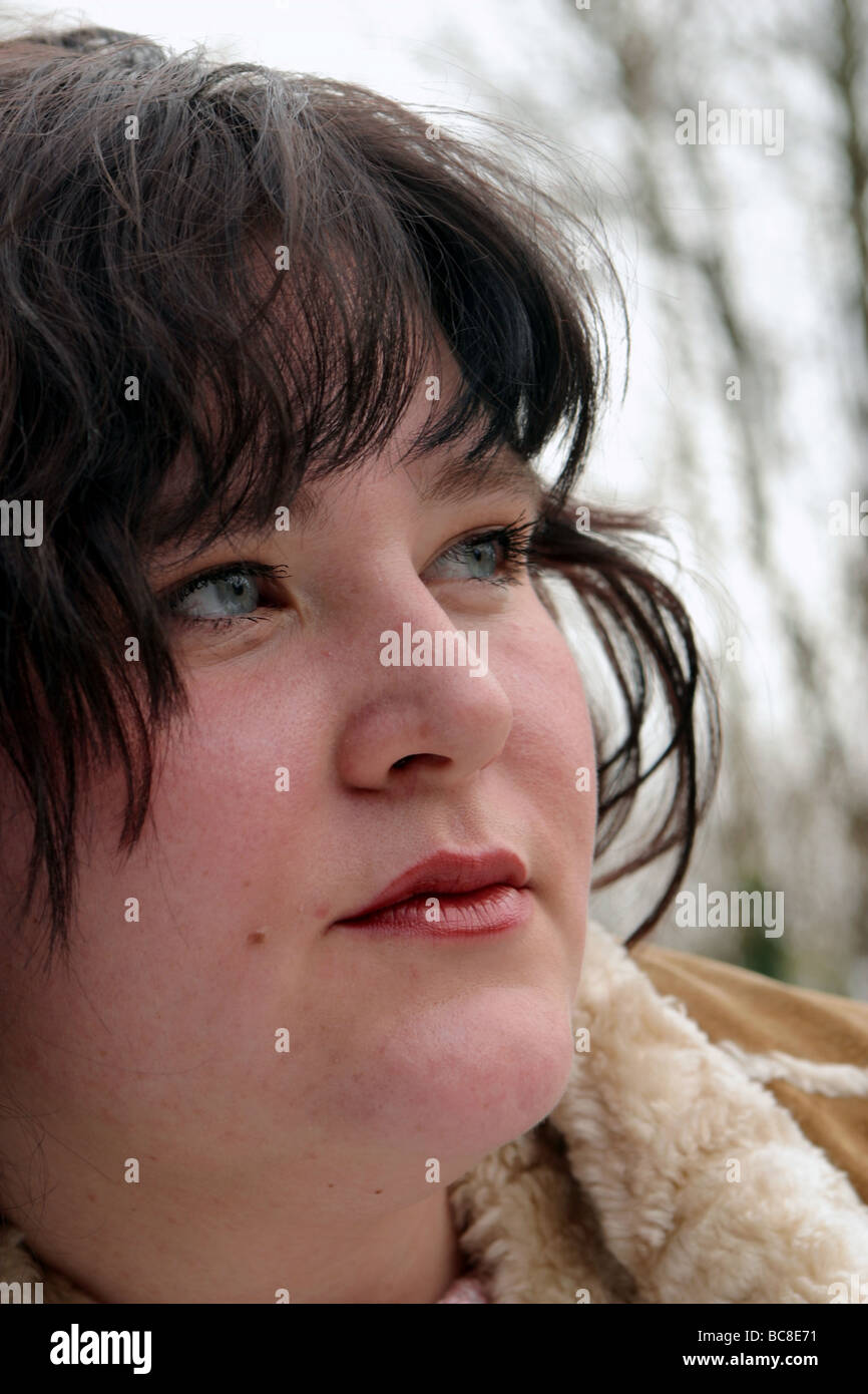 Obese face plus sized young woman Stock Photo