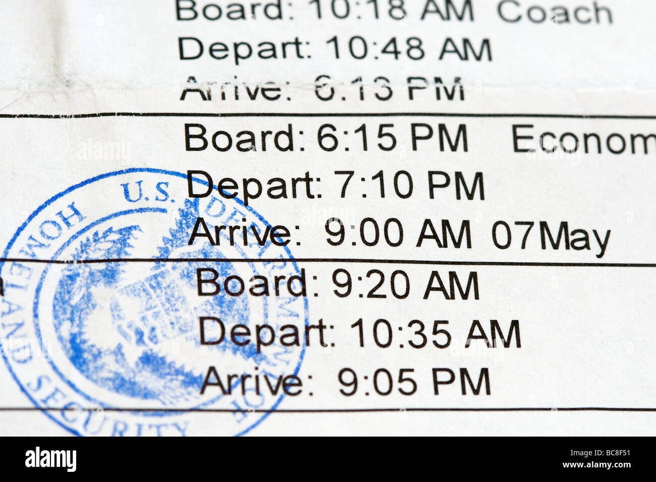 Boarding pass and airline ticket with Homeland Security approval stamp Stock Photo