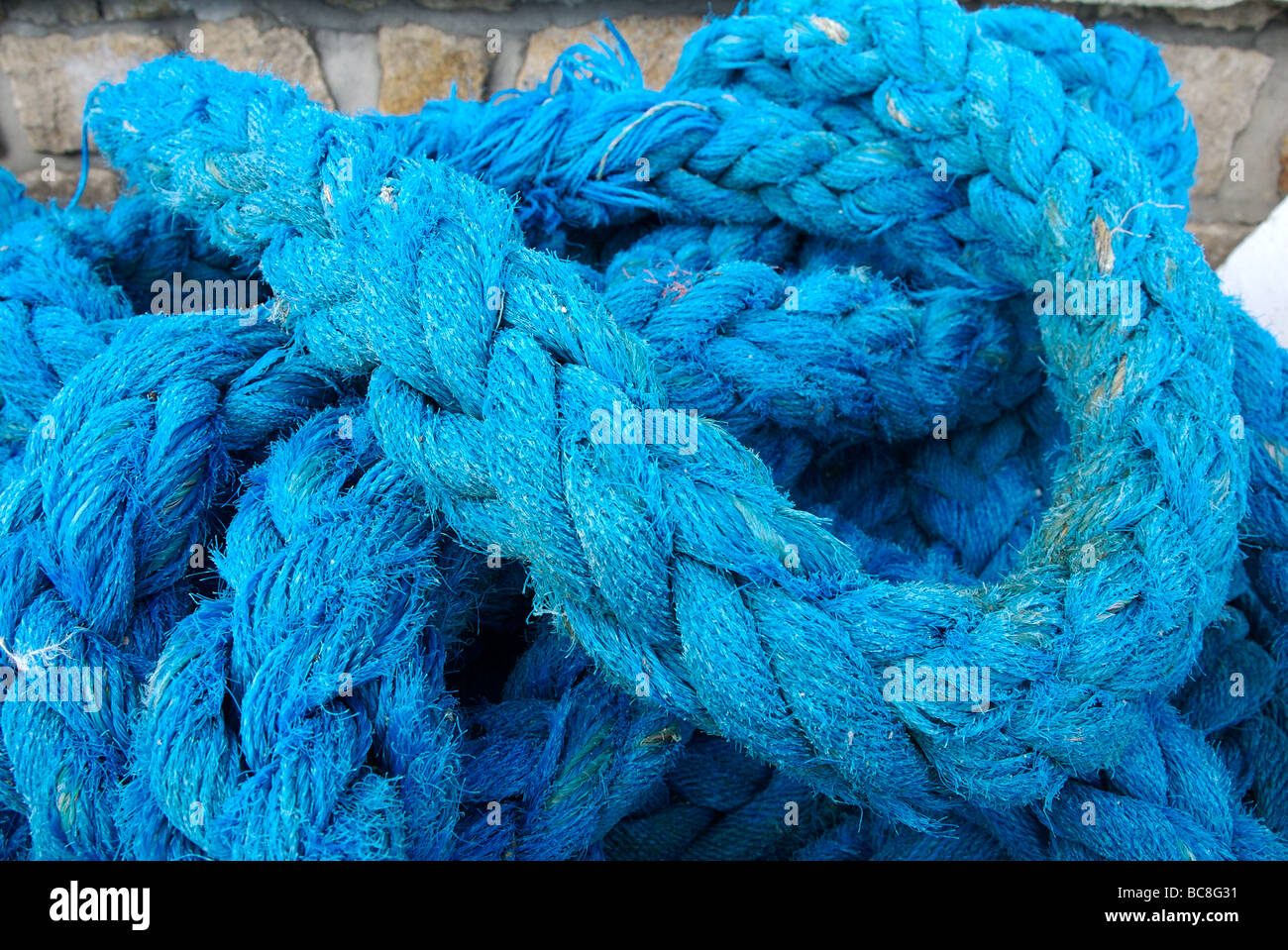Twisted bright blue fishing rope, Roscoff, Brittany, France Stock Photo