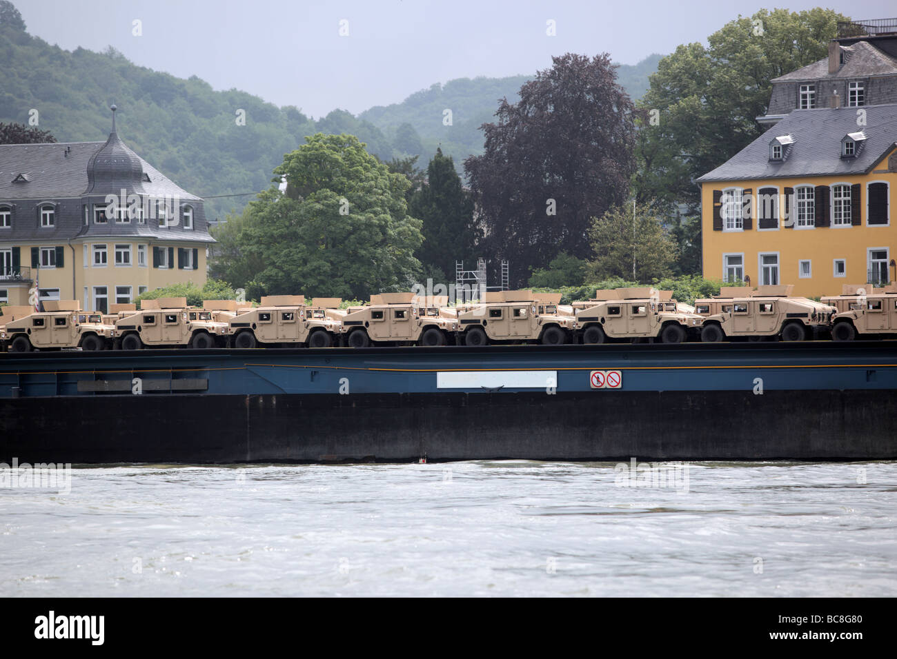 Humvee Vehicles on transport along the River Rhine Germany Europe Stock Photo
