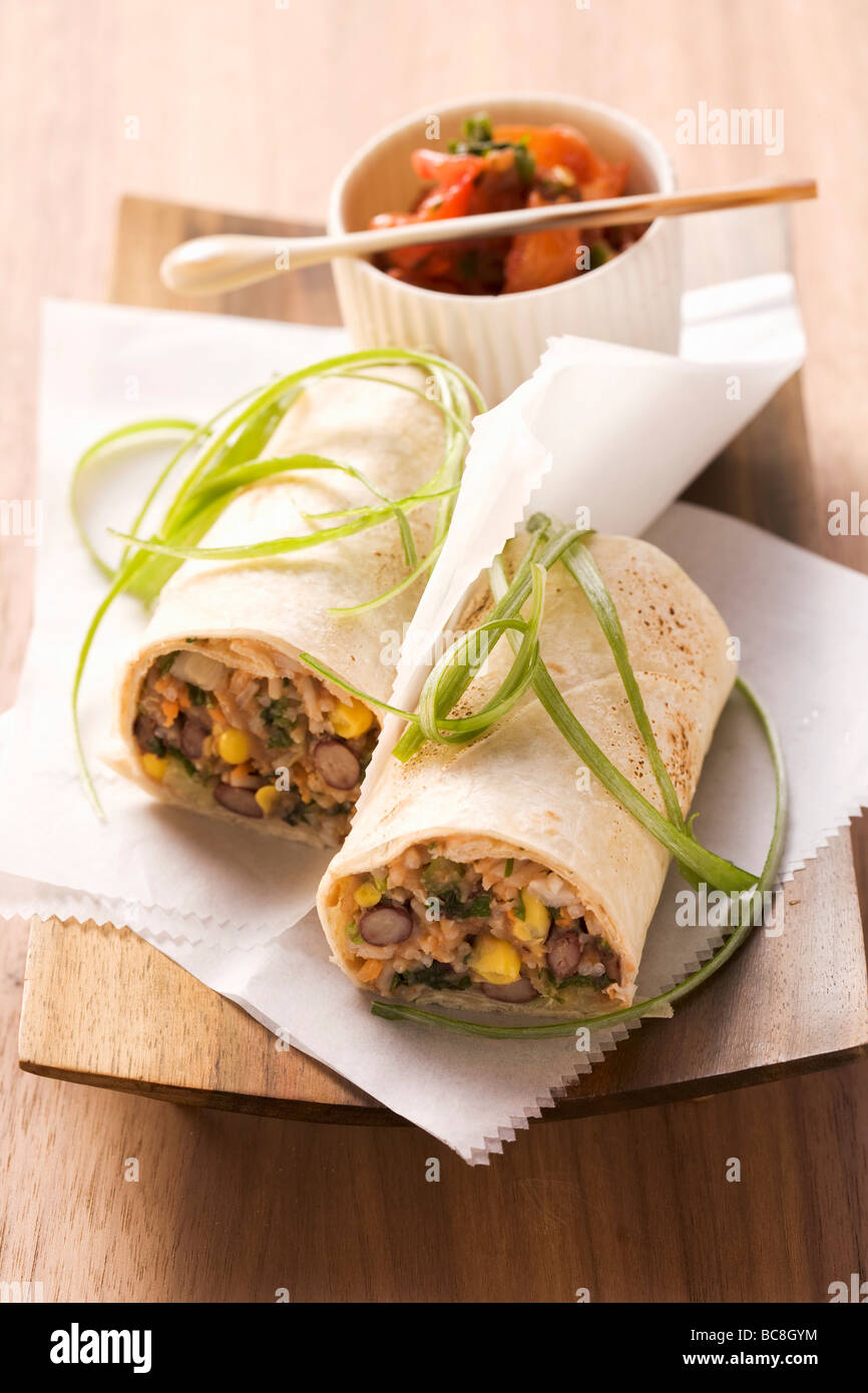 Bean burritos, tomato salsa Stock Photo Alamy