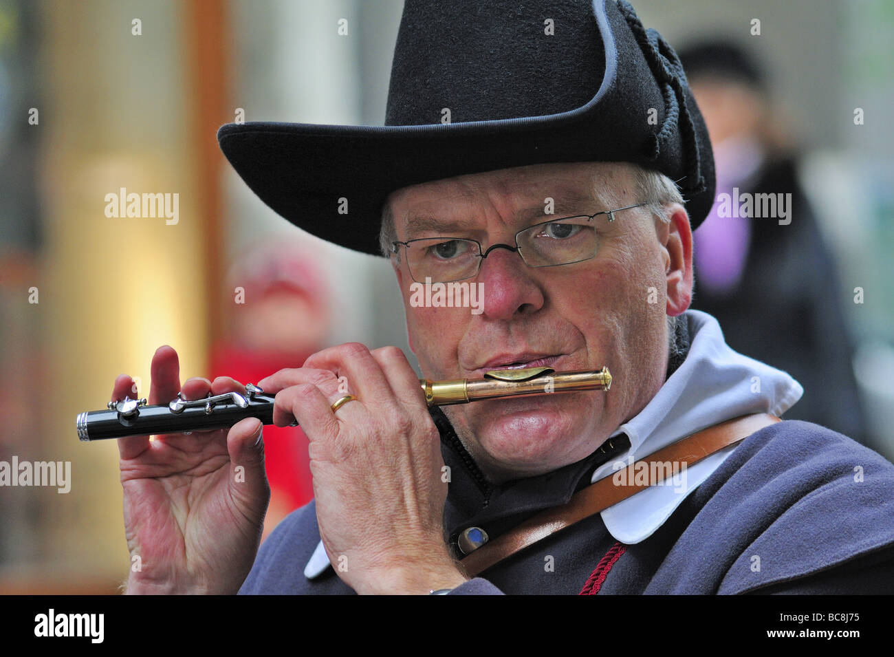 Piccolo player playing in a military band in Geneva's Escalade festival