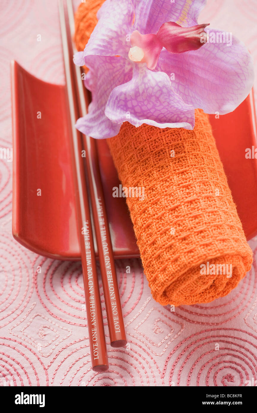 Asian placesetting with orchid Stock Photo Alamy