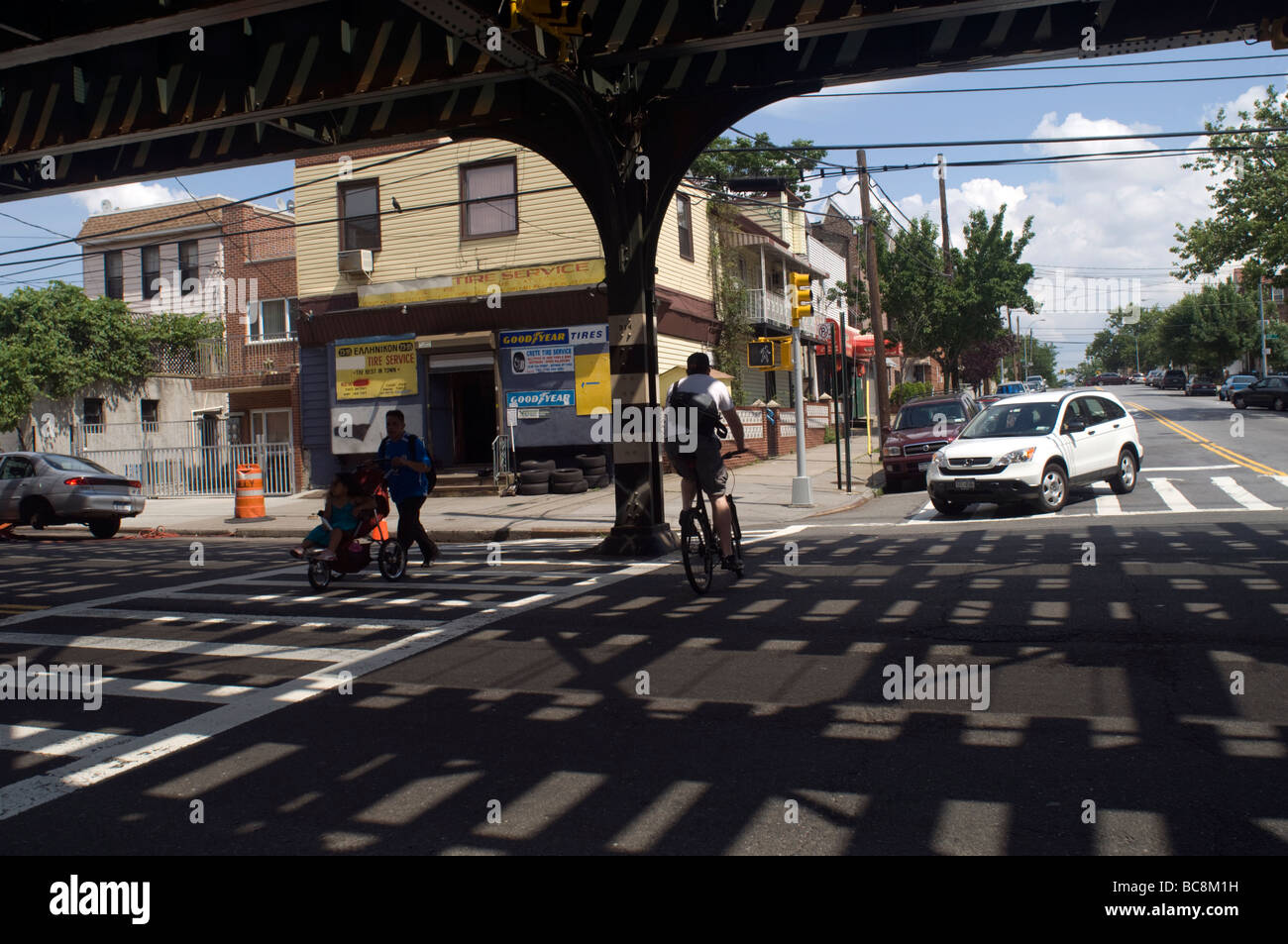 Under the elevated subway tracks in Astoria Queens in New York on June 27 2009 Frances Roberts Stock Photo