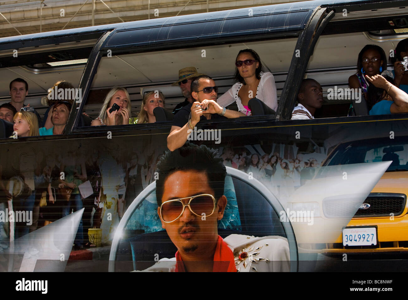Tourists on a bus sightseeing Hollywood Blvd Hollywood Los Angeles County California United States of America Stock Photo