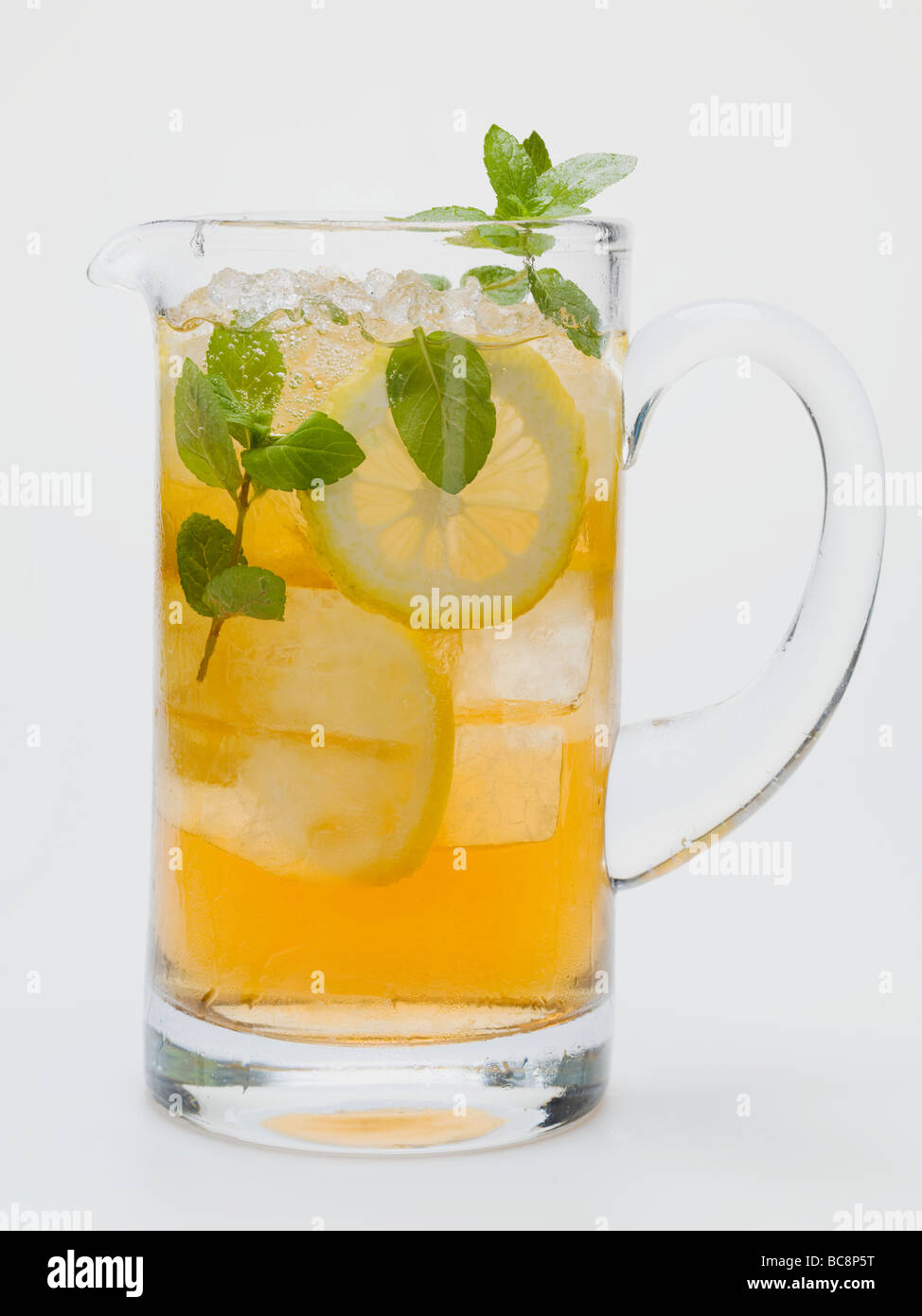 A Pitcher of Iced Tea with Lemons – License Images – 647456