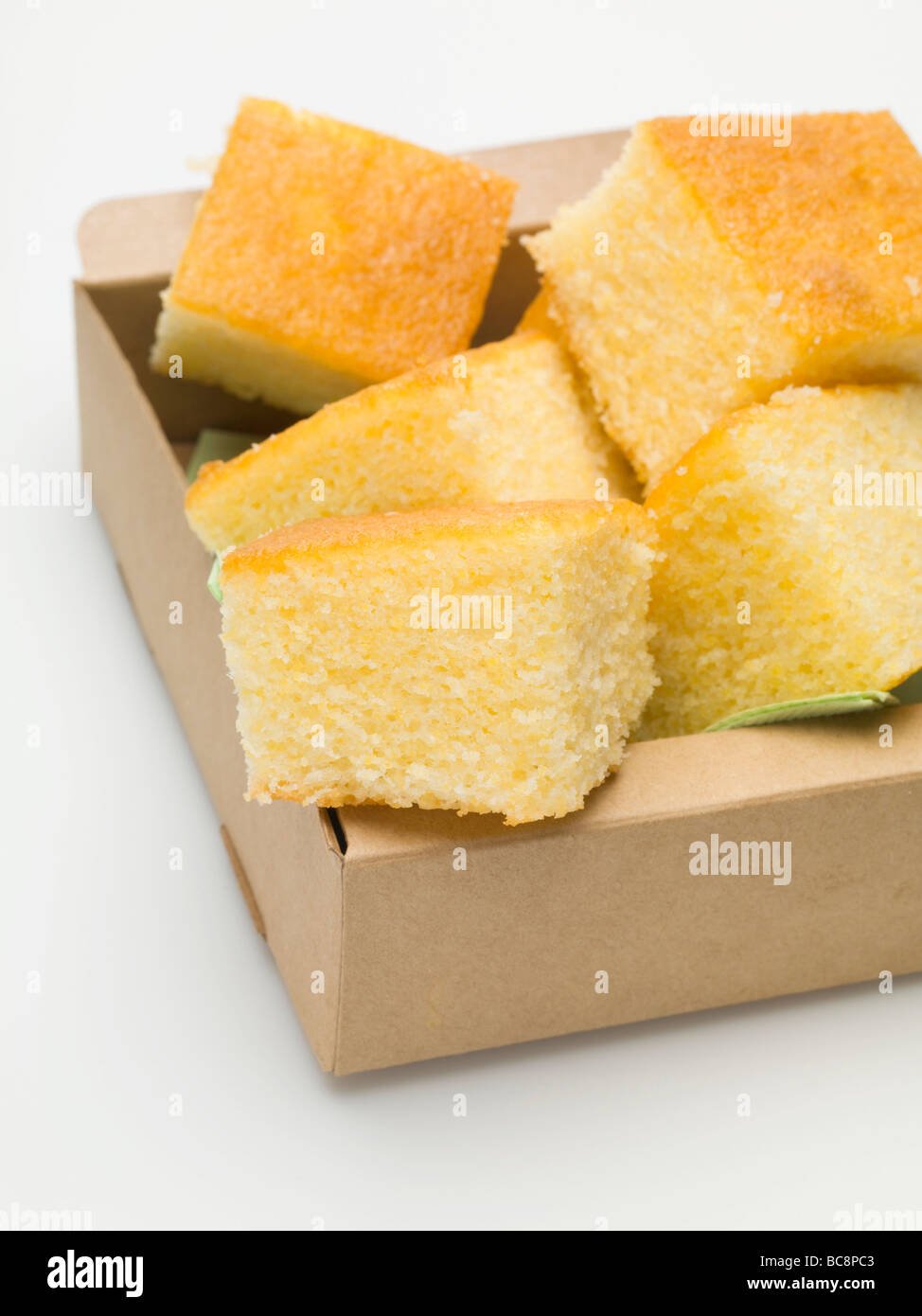 Cubes of cornbread in cardboard box Stock Photo Alamy