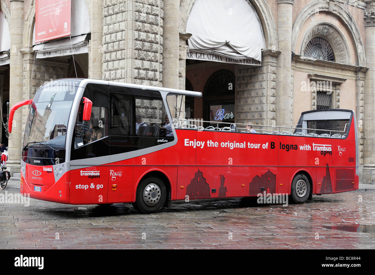 tourist bus known as the trambus open in piazza maggiore bologna italy  Stock Photo - Alamy
