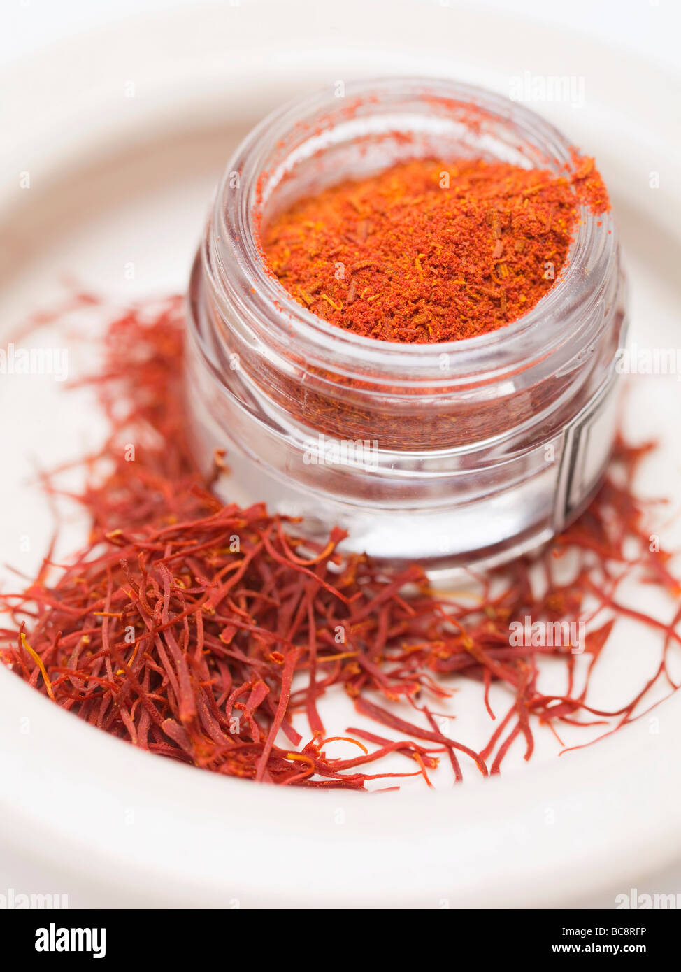 Saffron powder and saffron threads Stock Photo Alamy