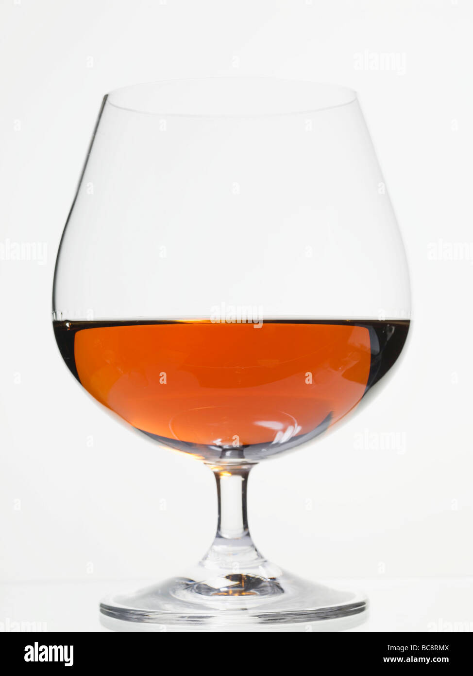 Cognac in a brandy snifter - Stock Photo