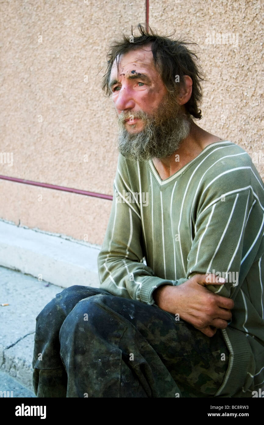 Homeless poor alcoholic in depression. Stock Photo