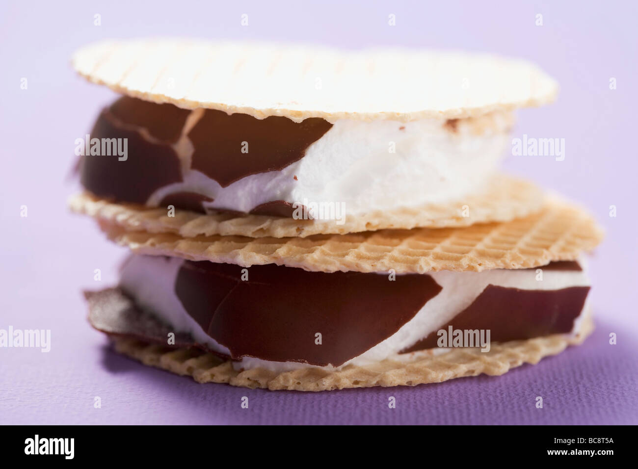 Chocolatecoated marshmallows sandwiched between wafers Stock Photo Alamy