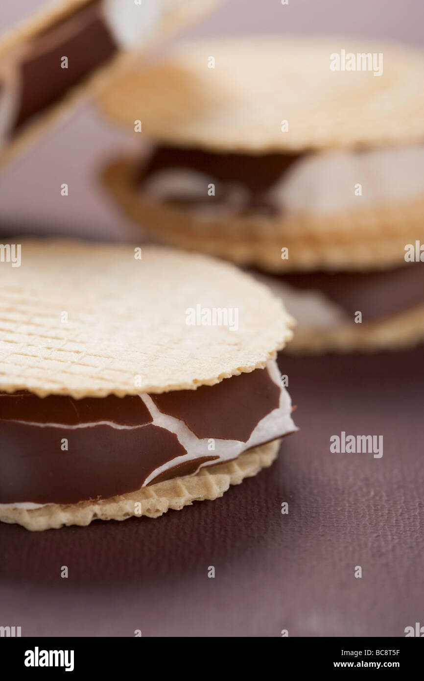 Chocolatecoated marshmallows sandwiched between wafers Stock Photo Alamy