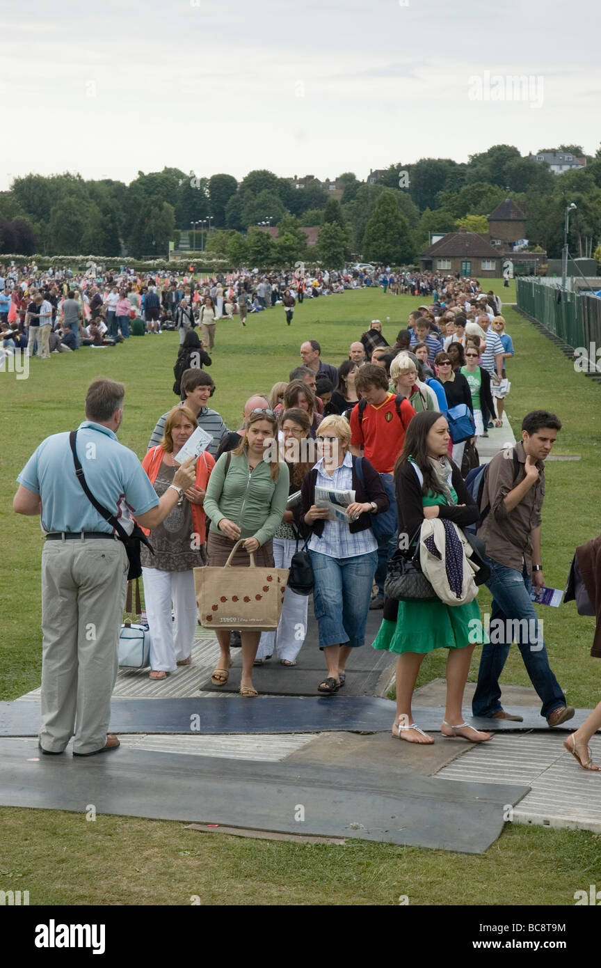 People queuing In Wimbledon Park for tickets for the Wimbledon Tennis Championships Stock Photo