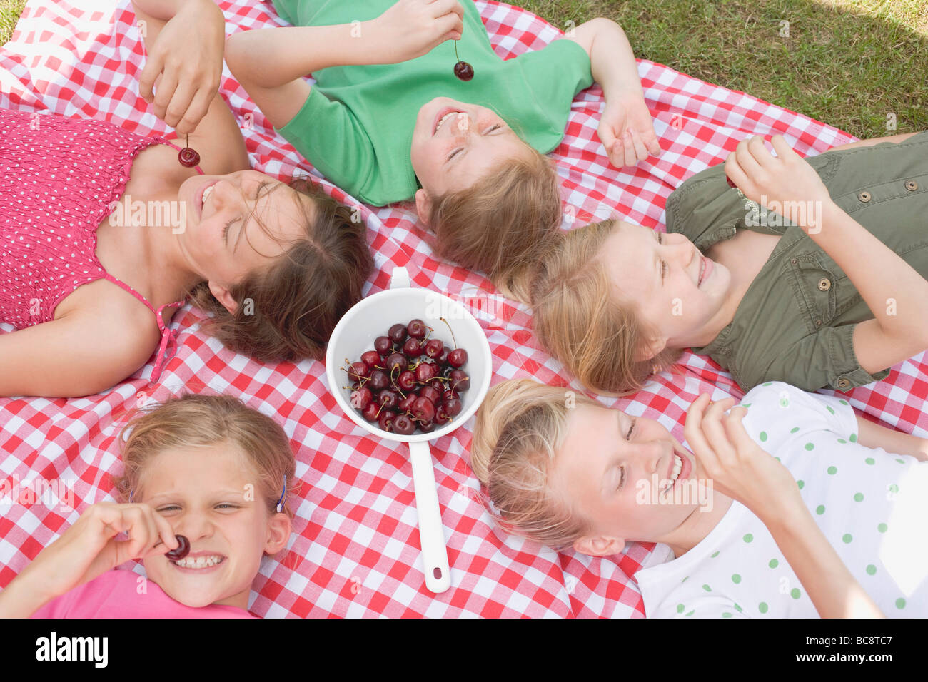 Children eating cherries Stock Photo Alamy