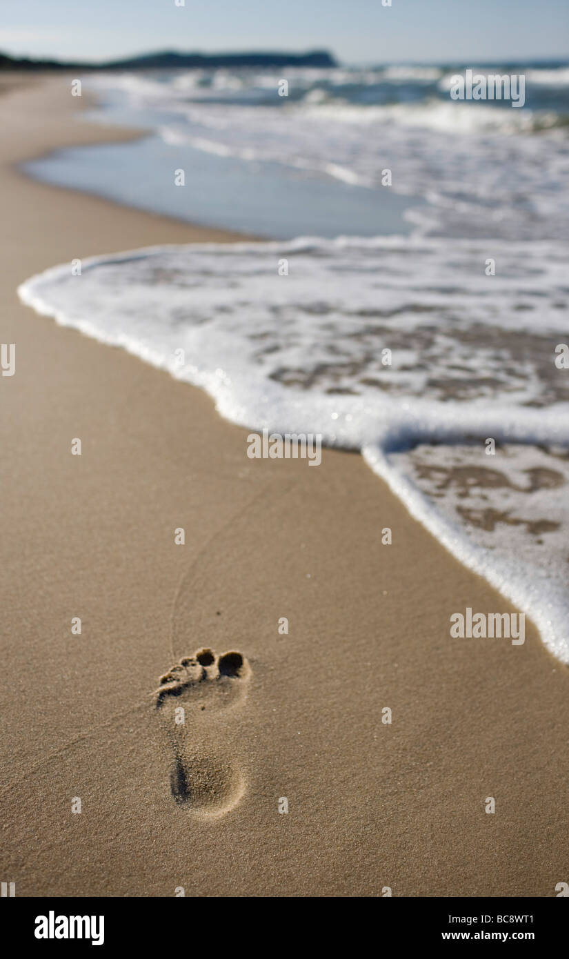 Footprint in sand Stock Photo