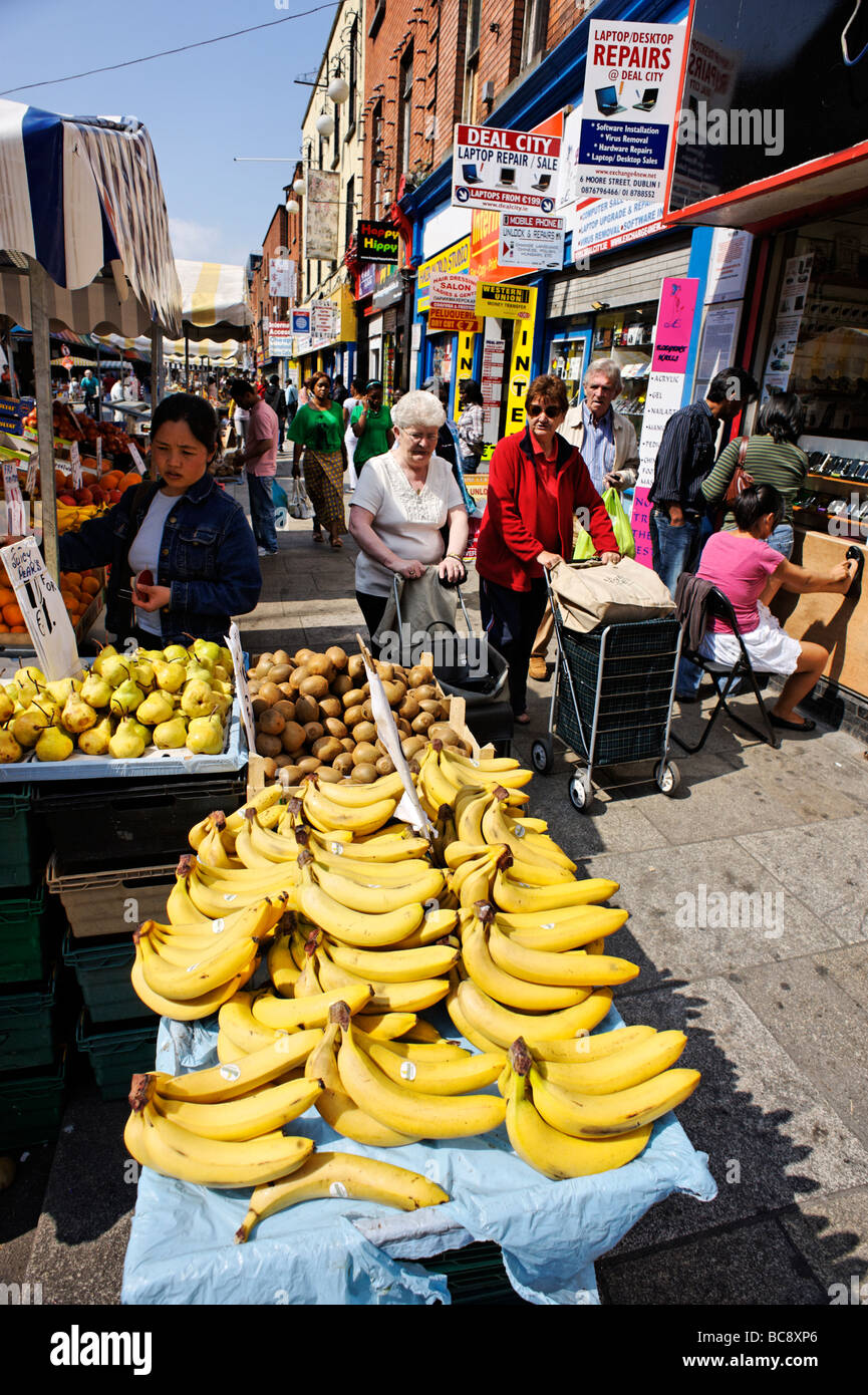 Fruit stand on Moore Street open air market in working class area of Dublin Republic of Ireland Stock Photo