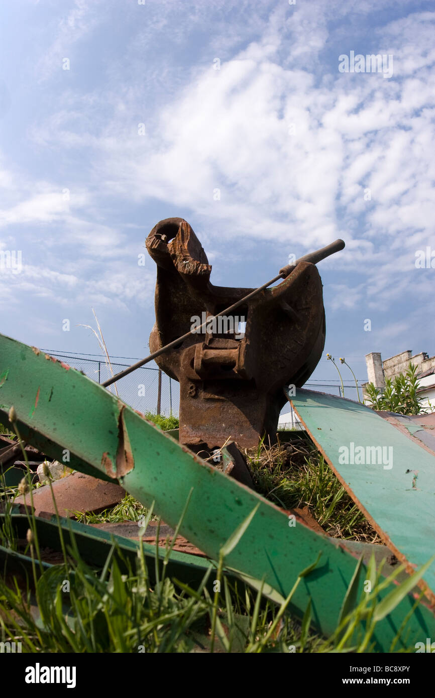 Railroad car coupler drawbar left over from a wreck reaches skyward