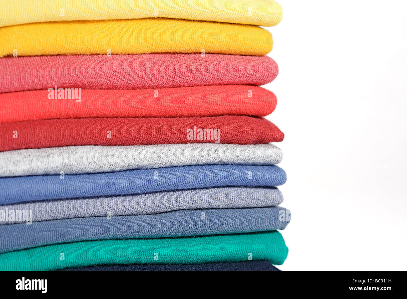 Multi Colored Tee Shirts stacked in a neat pile Stock Photo Alamy