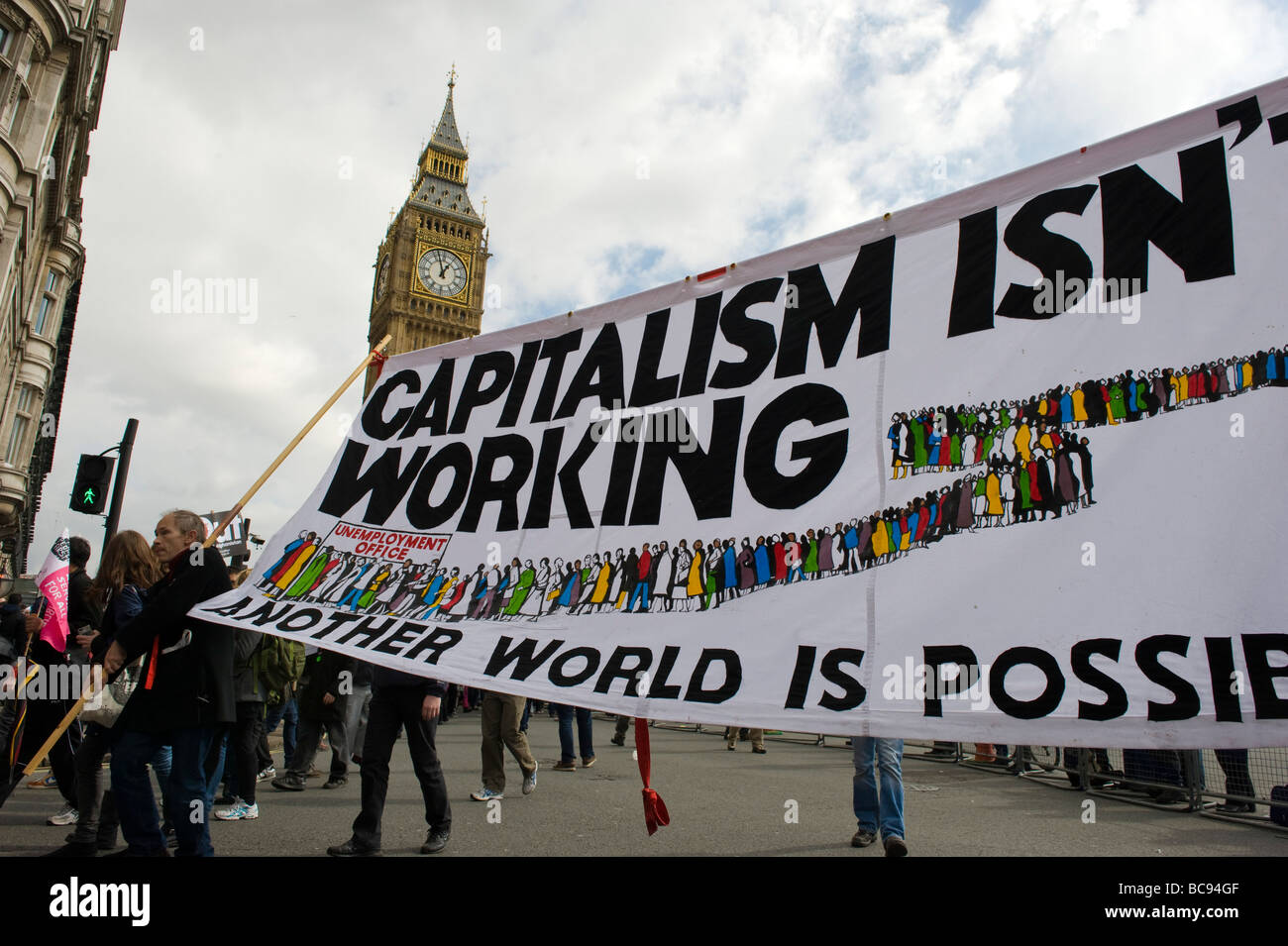 March for jobs, justice and climate ahead of the G20 summit in London, banner  'Capitalism isn't working' Stock Photo