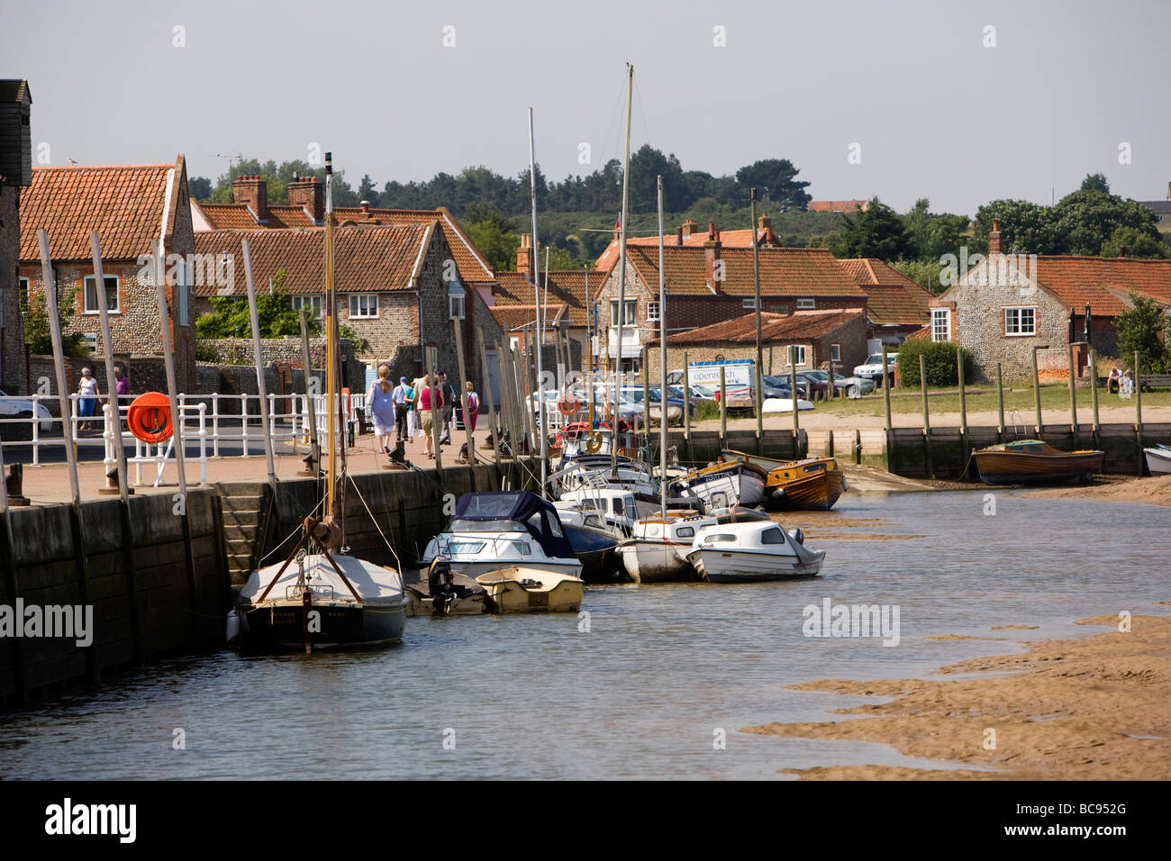 Blakeney village on the the north Norfolk coast in England with estuary and quayside Stock Photo