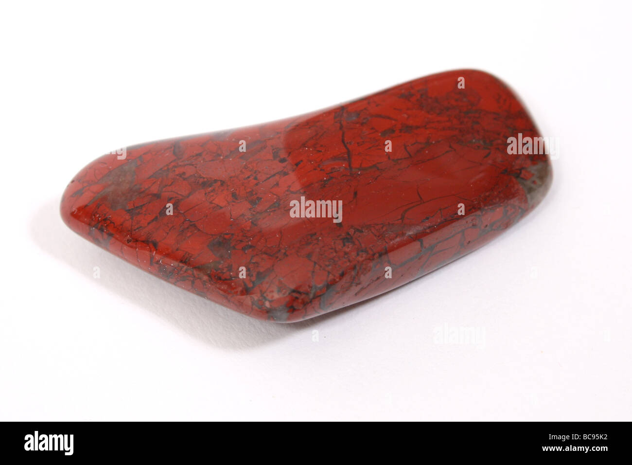 A Red Jasper healing crystal. Stock Photo