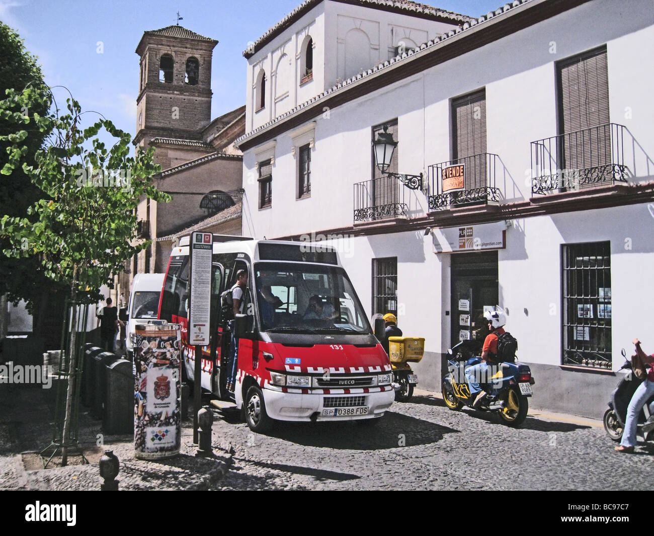 GRANADA, Spain  - bus service negotiating the narrow streets in the upper city Stock Photo