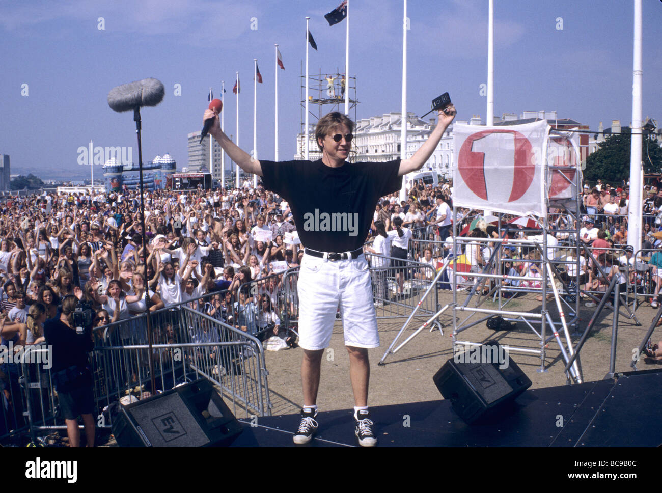 BBC Radio 1 One Roadshow Plymouth Hoe Simon Mayo Crowd fans. August 1995  Stock Photo - Alamy